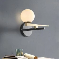 Applique Murale Doré Avec Boule En Verre -Lumeers Boutique product image 1393812852 7f4f68d2 c147 4f25 b6e5 90b0dd1b4661