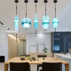 Suspension Design LED En Verre Bleu De Plusieurs Formes 18 Suspension Design LED En Verre Bleu De Plusieurs Formes -Lumeers Boutique product image 1708166174 534c7540 cf84 4510 82bd 6b932bf2580e