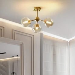 Lustre Moderne LED Base En Métal Avec Des Globes En Verre Yue 10 Lustre Moderne LED Base En Métal Avec Des Globes En Verre Yue -Lumeers Boutique product image 1771632221